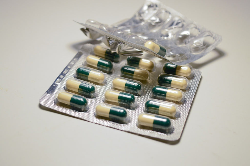 Het effect van antibiotica op je darmmicrobioom en hoe probiotica helpen